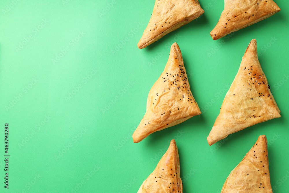Flat lay composition with samsa on green background Flat lay composition with samsa on green background