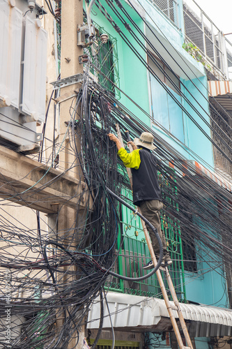 an electrician at his daily work