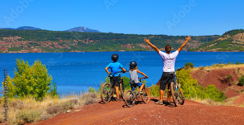 father and children with bike in France- Aveyron