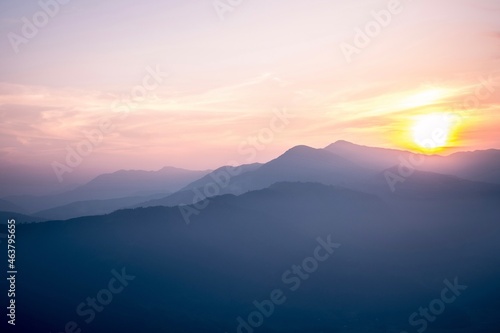Stunning sunset in the mountains  pink  blue  orange  calm scene  peaceful location