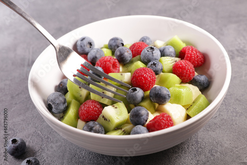 juicy fruit salad and fork