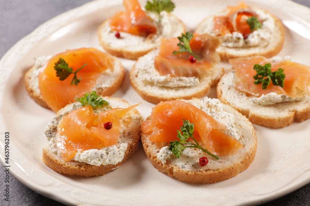 canape, buffet food, bread toast with cream cheese and smoked salmon canape, buffet food, bread toast with cream cheese and smoked salmon
