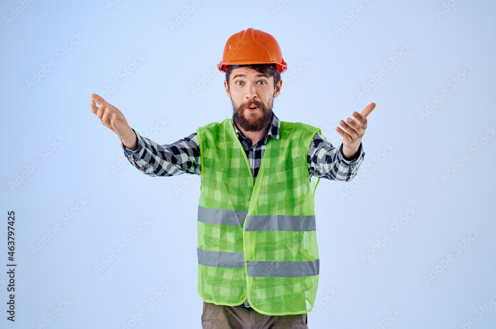 bearded man green vest orange helmet workflow hand gestures isolated background