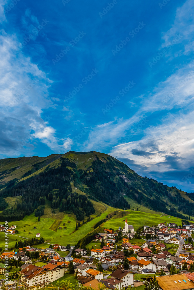 Naklejka premium Mountain Village on Summer day