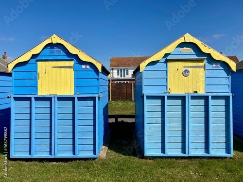 beach huts with blue sky