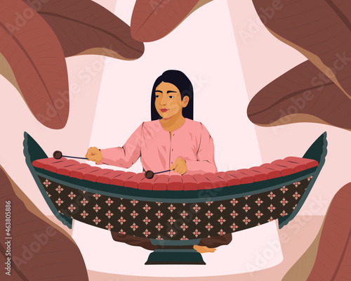 Woman playing Asian Ranat ek xylophone percussion instrument