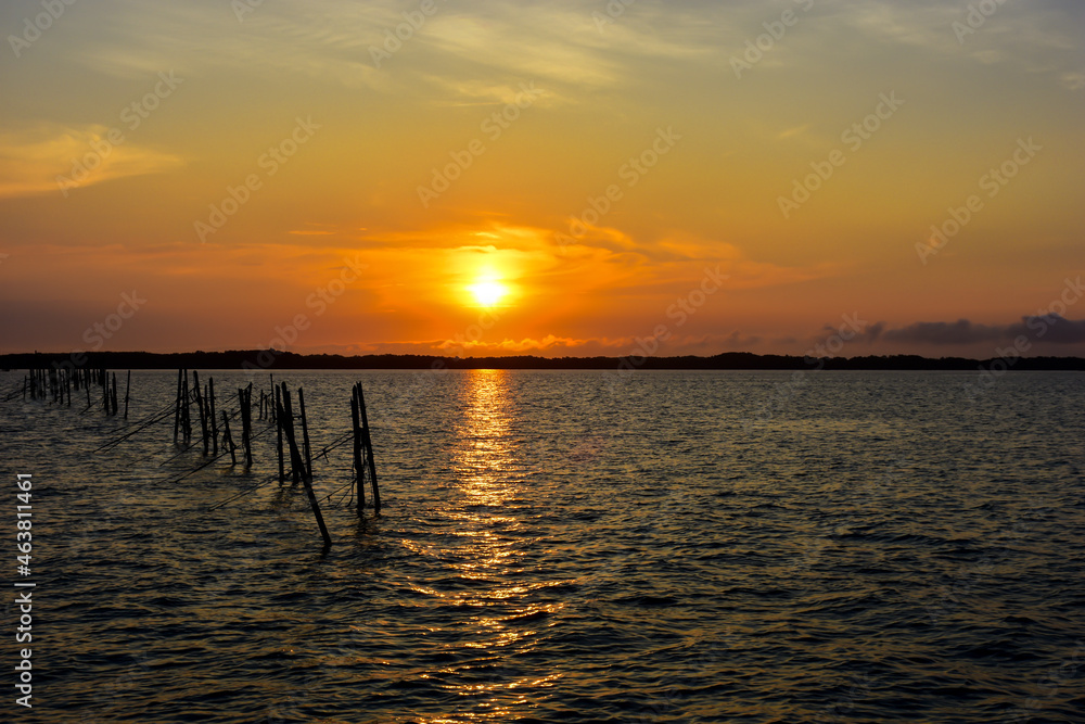 View of sunset light with clouds over the sea View of sunset light with clouds over the sea