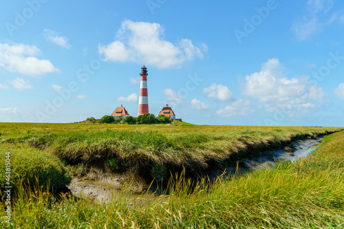 Lighthouse Westerhever in Schleswig Holstein  Germany. View on landscape by national park Wattermeer in Nordfriesland.