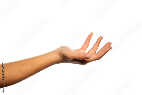 Female hand holding nothing, isolated on white. 