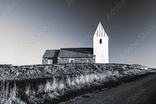 Canvas Print Trans Kirke, White little church on Bovbjerg Klint in Denmark.