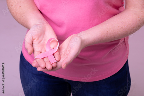Wallpaper Mural Hands of caucasian woman in pink tshirt holding pink ribbon Torontodigital.ca