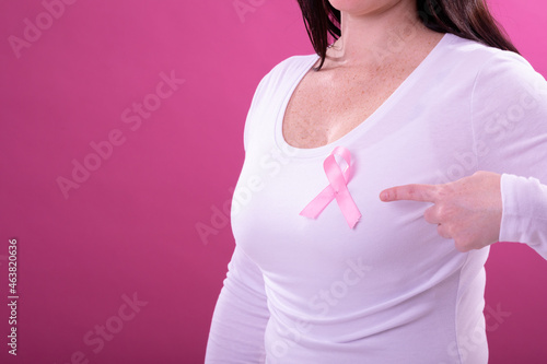 Wallpaper Mural Midsection of caucasian woman in white tshirt with pink ribbon gesturing Torontodigital.ca