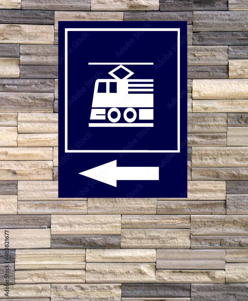 Hight speed train transport sign with white arrow on brick wall , train platform station symbol, Hight speed train transport sign with white arrow on brick wall , train platform station symbol,