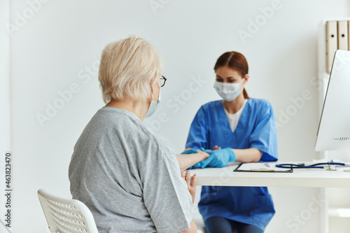 elderly woman and doctor Hospital visit treatment