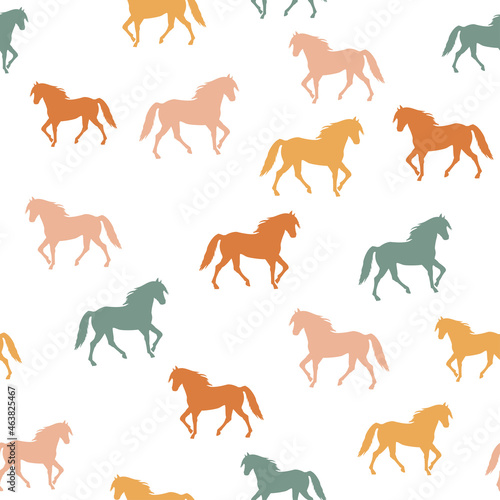 Seamless pattern with colorful walking horses silhouettes on white background. Vector illustration for baby, kids textile,  fabric. EPS 10