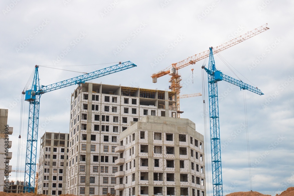The architectural complex of residential buildings on sky background The architectural complex of residential buildings on sky background