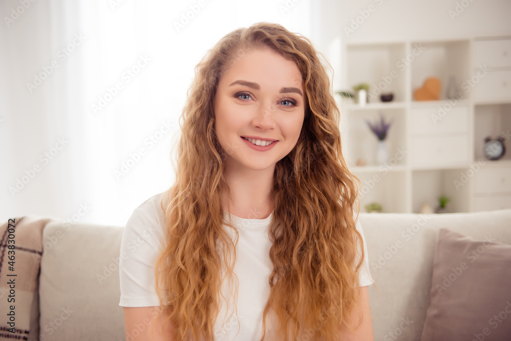 Photo of lovely cute nice positive redhead woman toothy smile indoors home Photo of lovely cute nice positive redhead woman toothy smile indoors home