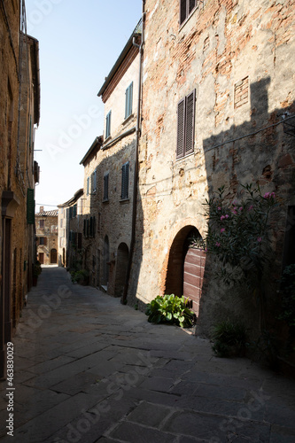 Fototapeta Naklejka Na Ścianę i Meble -  Castelmuzio (SI), Italy - August 08, 2021: View of Castelmuzio houses and town, Tuscany, Italy