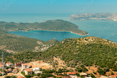 Top view of the green hills of the Kas peninsula, the blue bay and the Greek island of Kastelorizo