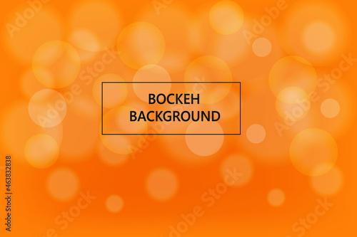 Abstract orange background with bokeh lights photo