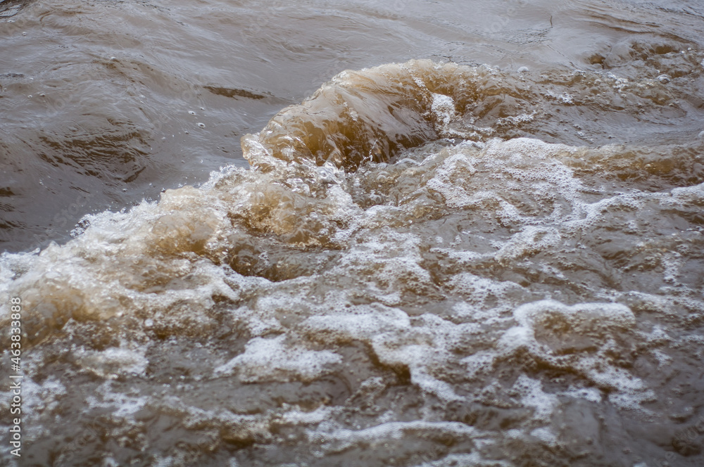 Fast flowing cold water mountain stream, flowing stormy stream stream, nature outdoors, fresh stream dark blue water Fast flowing cold water mountain stream, flowing stormy stream stream, nature outdoors, fresh stream dark blue water