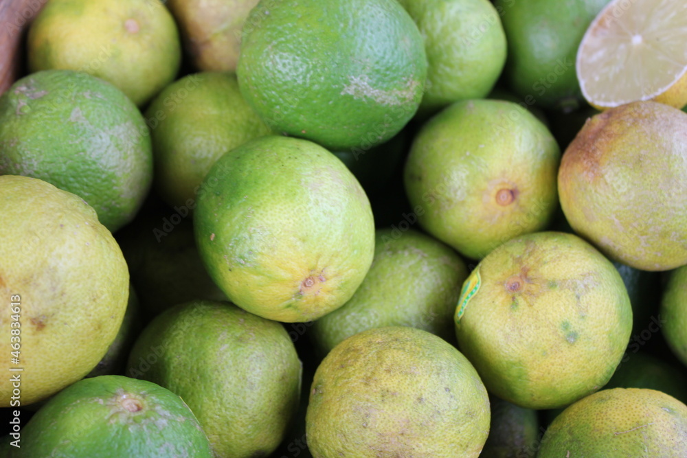 green lemons in the market