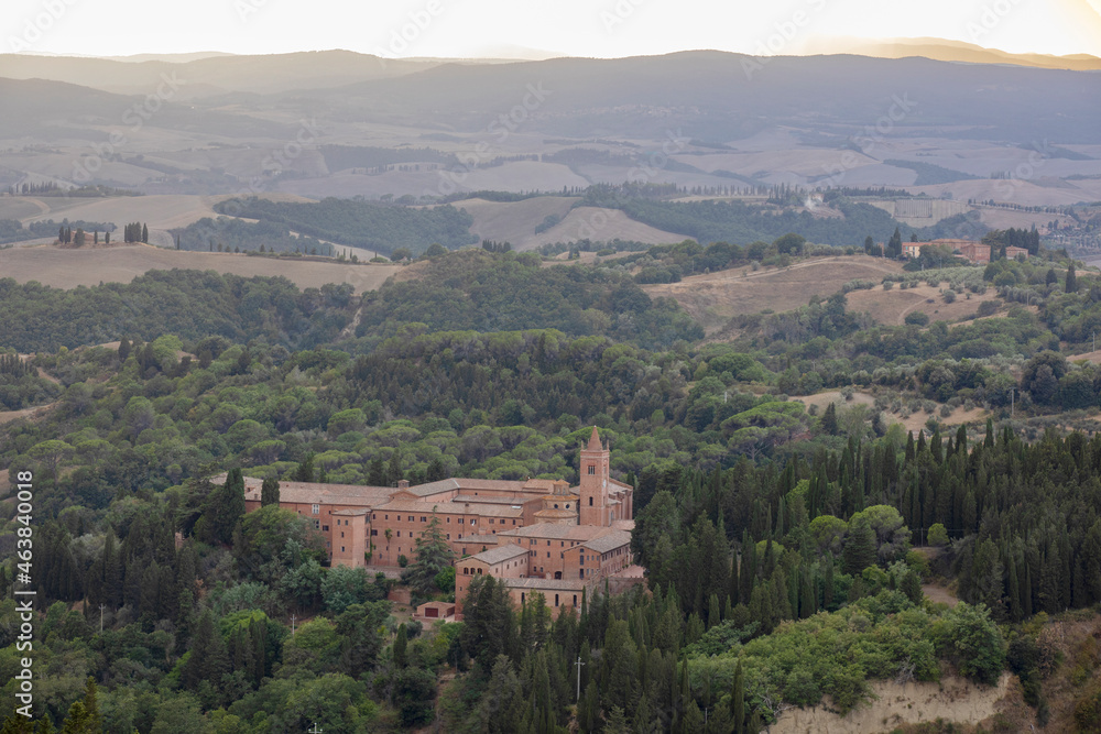 Chiusure, Asciano (SI), Italy - August 15, 2021: Landscape view from Chiusure village and Monteoliveto Maggiore Abbey, Asciano, Tuscany, Italy