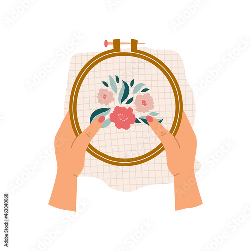 Female hands holding embroidery hoop with floral embroidery isolated on white background.  Modern  colorful vector hand drawn illustration