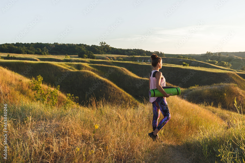 Sporty, beautiful woman on the hills Sporty, beautiful woman on the hills