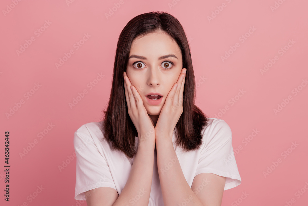 Portrait of attractive girl amazed shock omg wow fake news stupor unexpected isolated over pink color background Portrait of attractive girl amazed shock omg wow fake news stupor unexpected isolated over pink color background