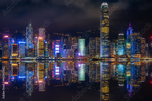 Cityscape with skyscraper at night in Hong Kong. photo