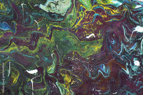 Liquid marble paint background. Liquid painting abstract texture. A colorful combination of acrylic dark and vibrant colors. Paper marbling is a method of aqueous surface design © olesyabasova
