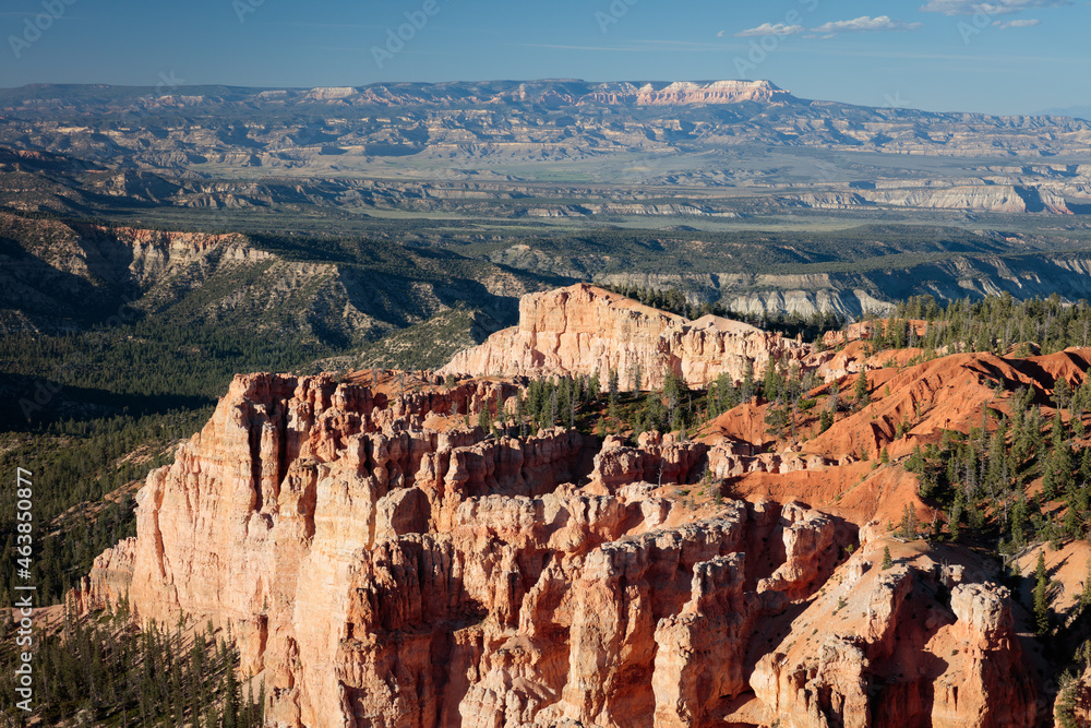 Bryce Canyon scenery with layers of forest and desert spires, view from Rainbow Point.
