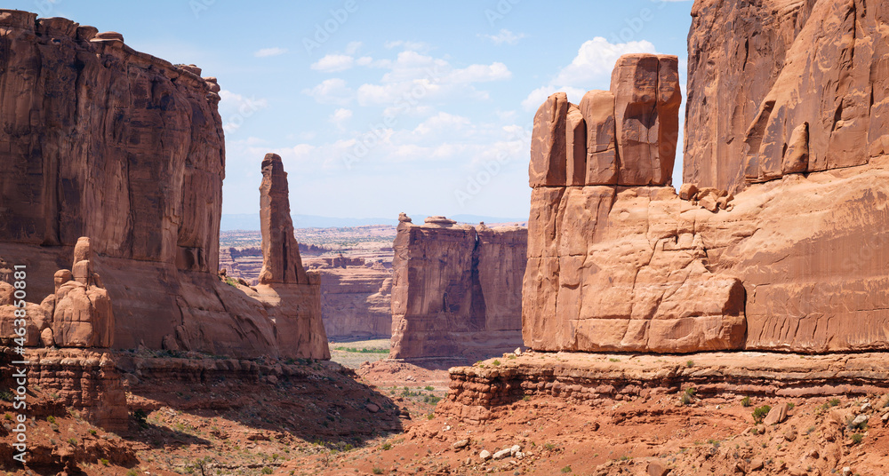 Fototapeta premium Panorama of red sandstone towers and cliff features in Arches National Park, Utah. Landmark known as Park Avenue.