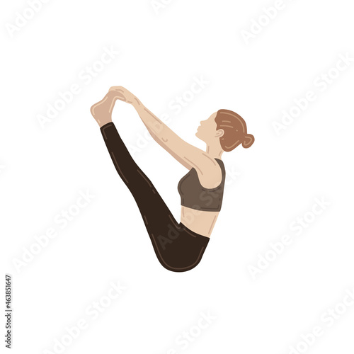 Young slim woman doing yoga exercise. Ubhaya Padangusthasana, both big toes pose photo