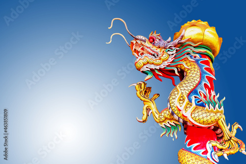 Golden Dragon Chinese natural backdrop of a motion blur. © chalermphon
