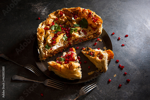 Vegeterian filo pastry with butternutsquash, spinach, feta cheese and pomegranate seeds