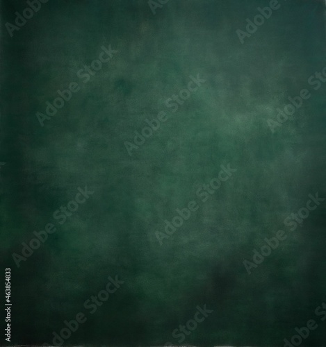 Dark green handpainted background with vignetting 