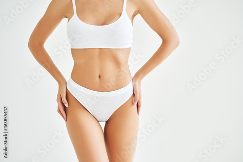 Perfect sporty body in white underwear of young woman © GVS