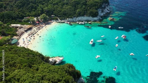 Aerial drone video of tropical paradise turquoise bay and sandy beach in popular Mediterranean destination island