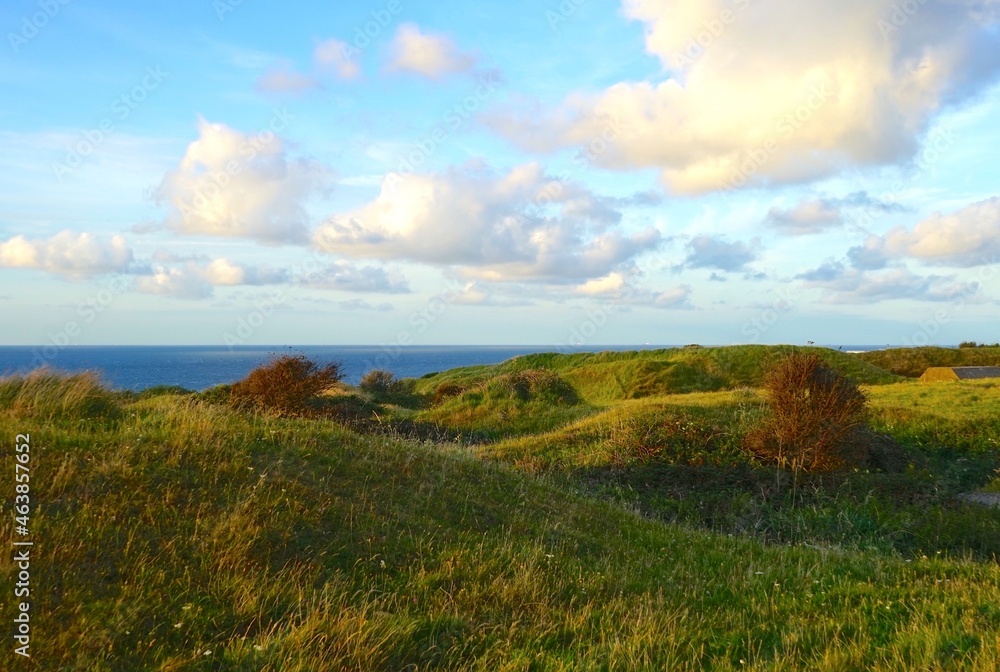 landscape at Cap Gris-Nez with hilly meadows in the foreground and the ocean in the background at the evening, opal coast, Pas-de-Calais, Hauts-de-France, France