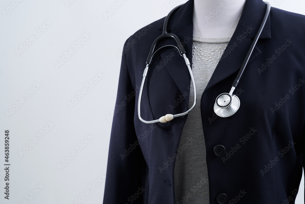 close up midsection of women and stethoscope close up midsection of women and stethoscope