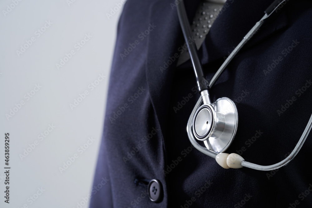 close up midsection of women and stethoscope close up midsection of women and stethoscope
