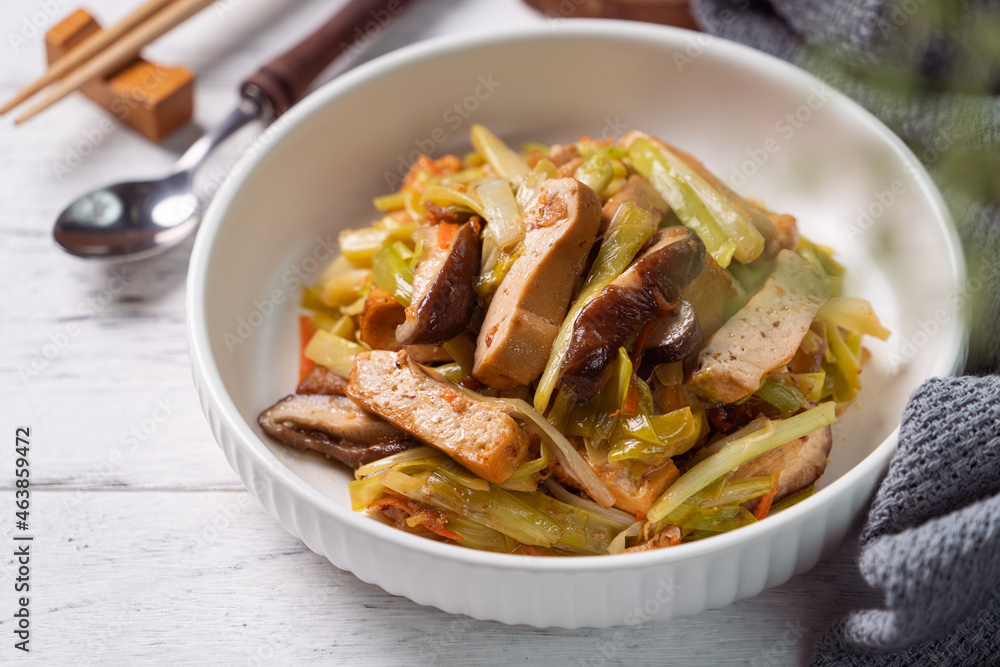 Homemade stir-fried dried beancurd with leek sprouts. Homemade stir-fried dried beancurd with leek sprouts.
