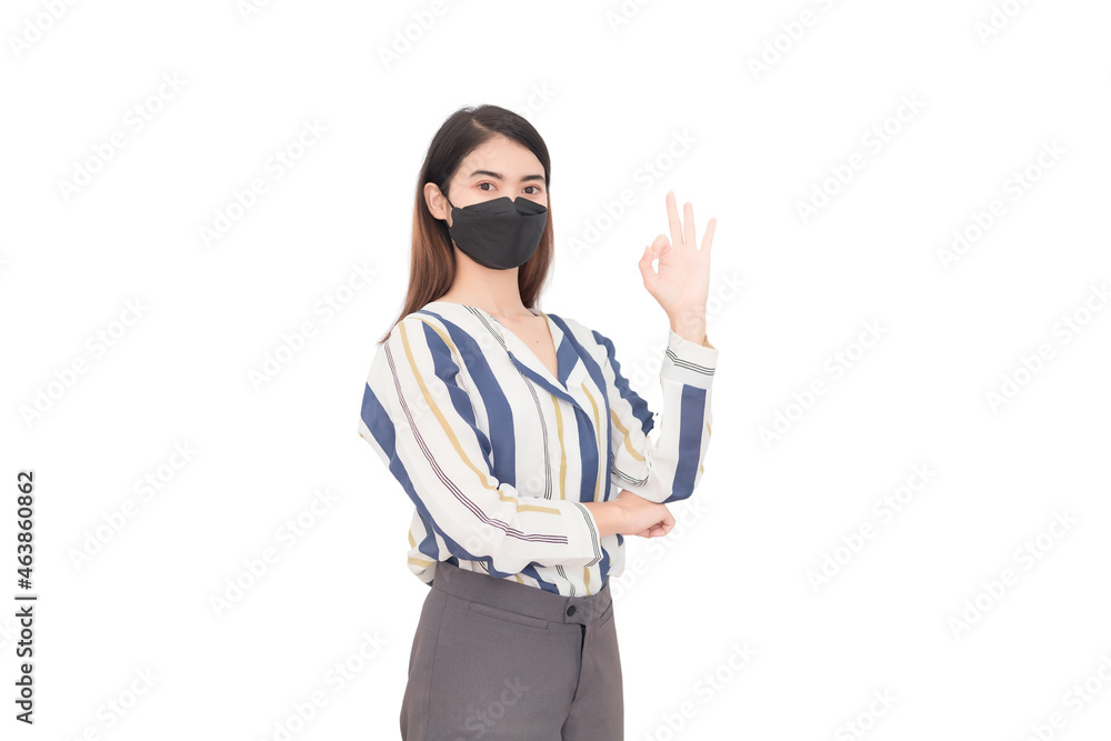Thai Asian businesswoman standing looking at camera and pointing her finger Thai Asian businesswoman standing looking at camera and pointing her finger