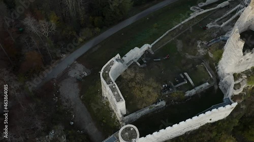 Aerial tilts up and shows Pfeffingen Castle , Switzerland photo