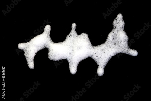 White bubble foam splash explosion on black background