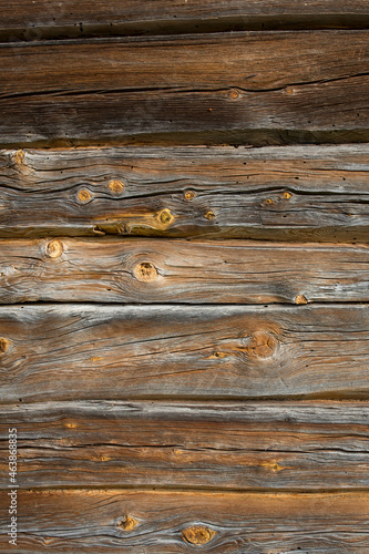 Wallpaper Mural Wooden logs of an old house. Close-up. Weathered natural gray wood texture. Background. vertical photo. Torontodigital.ca