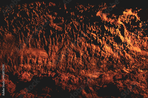 Dark, colorfulTextures of the walls in a lava tube of Canaria island