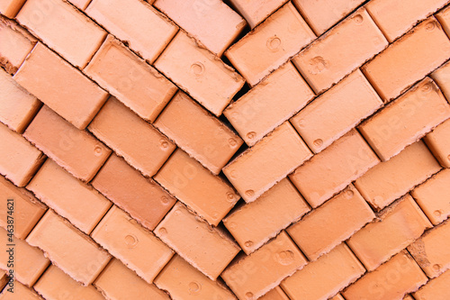 Red and orange brick wall. Brick texture  close up